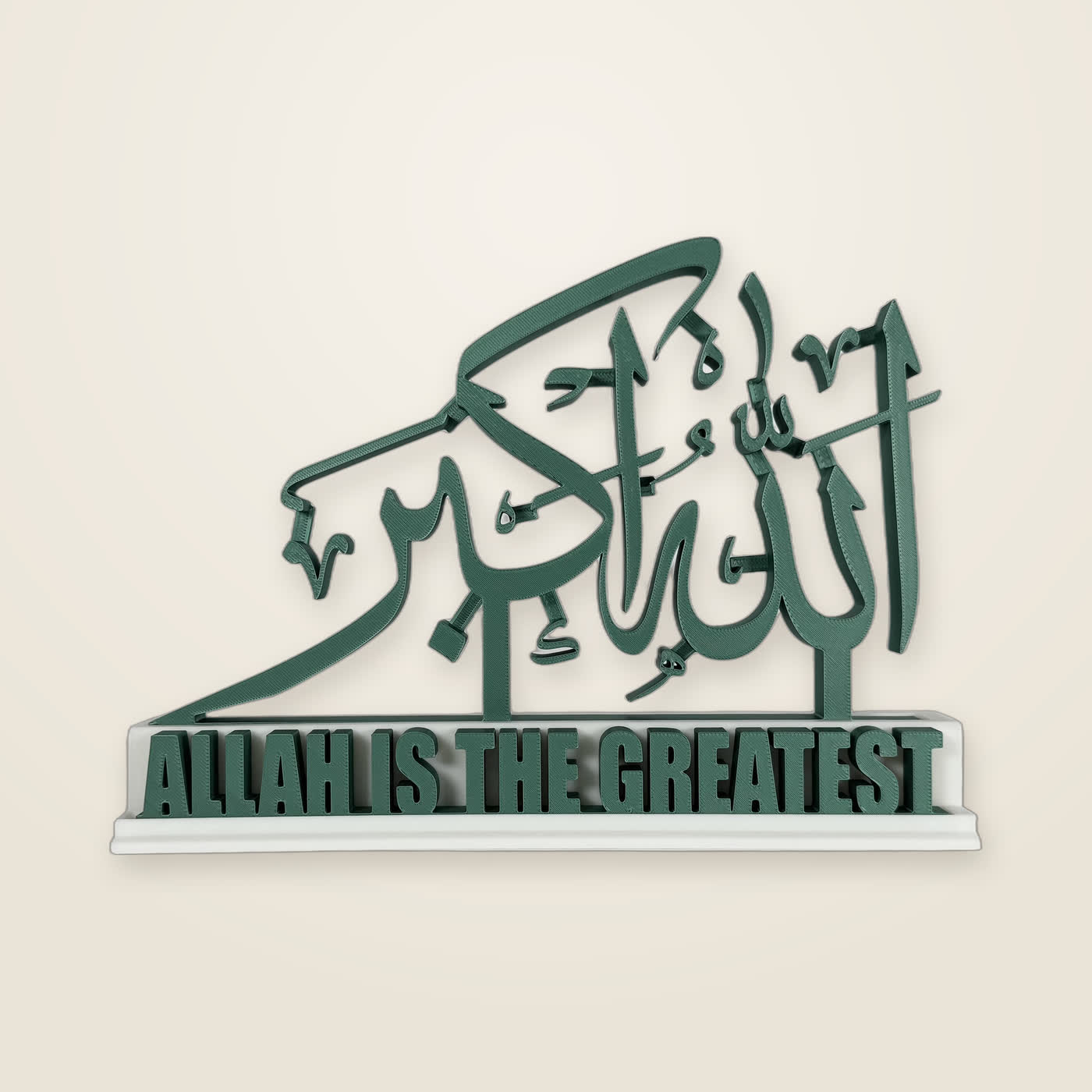 A free-standing Allahu Akbar piece in green and white, with its English bar